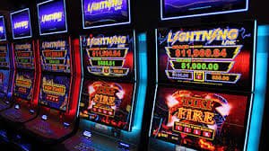 Ganesha Gold slot game reels and symbol layout at comtoto wap